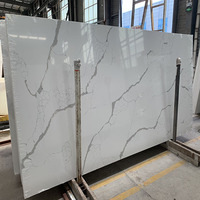 Exportateurs en gros de comptoirs modernes en quartz blanc Calacatta écologique avec veines grises, dalles de pierre naturelle, granit et marbre