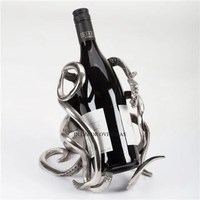 Base polie brillante argentée et feuilles plaquées or de haute qualité et support de support de bouteille de vin d'aspect attrayant de concepteur de grenade
