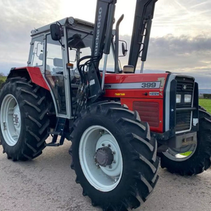 Massey Ferguson 399 con cargador autonivelante Quick 660 en venta - Product Image 1
