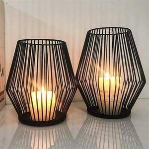 Farol de Hierro Negro Diseñado para Decoración Interior Minimalista que Brinda un Brillo Cálido y Suave con un Acabado Moderno y Elegante - Product Image 1