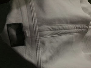 Combinaison d'arts martiaux professionnelle unisexe uniforme de Jiu Jitsu de haute qualité Logo personnalisé vente en gros uniformes de combat en coton pour hommes et femmes - Product Image 6