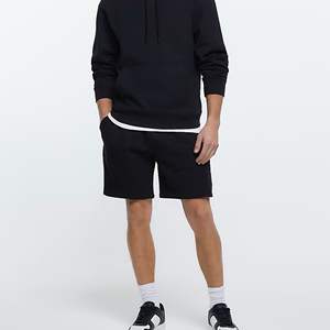 Pantalones cortos con logotipo bordado personalizado, 42% algodón, 58% poliéster, bolsillos laterales, elásticos, de cintura opaca, ajuste Regular, Jersey - Product Image 3