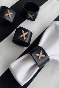 ห่วงรัดผ้าเช็ดปากทำจากหนังที่ออกแบบมาเพื่อเพิ่มความหรูหราให้กับโต๊ะสำหรับงานแต่งงานตามฤดูกาลและของตกแต่งวันหยุด - Product Image 2