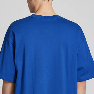 Venta al por mayor de camisetas con hombros descubiertos para hombres Color único Embalaje personalizado 100% Material de algodón - Product Image 4