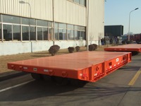 Mafi 40ft Steel Low Flatbed Heavy Duty Semi-Trailer Roll-On Roll-Off dengan Kapasitas Maksimum 100T untuk Transportasi Truk yang Efisien.