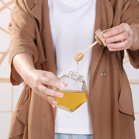 Fabricants en gros, logo personnalisé, bouteilles en verre pour miel de 50 ml avec bouchon à vis, imprimées à l'écran, pot ménager