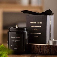 Bougies parfumées de cire de luxe de couleur noire dans les bougies aromatiques de pot en verre
