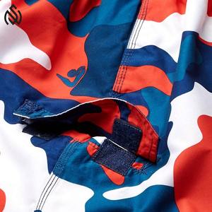 Pantalones cortos de playa para nadar de venta rápida para hombres con cintura con cordón elástico Forro de malla suave y bolsillos - Product Image 6