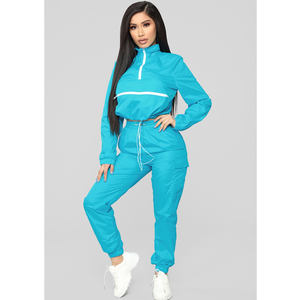 Conjunto de 2 piezas a prueba de viento de alta calidad para mujer, nuevo diseño, secado rápido, cremallera completa, nailon, cortavientos ligero para mujer, conjunto de nailon - Product Image 1