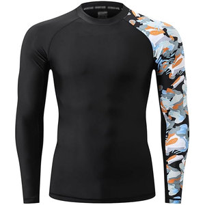 Rashguard pour homme, vêtements de fitness, coupe ajustée, tissu extensible, design professionnel, parfait pour l'entraînement, la gym et les sports. - Product Image 1