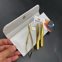Pince à épiler cosmétique pour les sourcils en acier inoxydable durable au plasma doré Ensemble de pinces à sourcils et de ciseaux avec pochette en cuir LOGO personnalisé