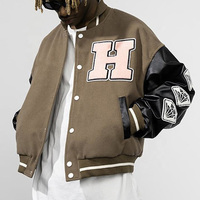 Veste universitaire personnalisée style streetwear hivernal avec broderie de patchs en chenille, logo frontal, coupe-vent, chauffante, respirante, en laine/cuir