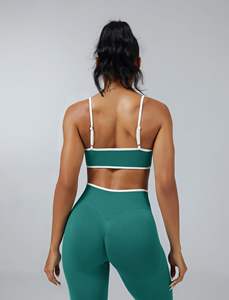 Logotipo personalizado de las mujeres de 2 piezas de entrenamiento gimnasio Fitness Yoga Set Venta al por mayor de ropa deportiva de patrón sólido Sujetador deportivo y Leggings - Product Image 5