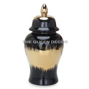 Pot de rangement en aluminium de qualité supérieure, forme ronde, finition or et noir, avec couvercles ouverts - Product Image 6