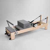 Reformer Pilates Kelas Komersial Grosir dengan Rangka Maple Amerika Utara yang Kokoh dan Per Pegas Jerman untuk Studio