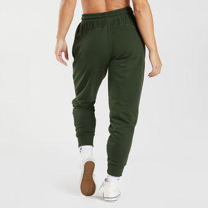 กางเกงจ็อกเกอร์ทรงหลวมสีเขียวสำหรับผู้หญิง ผลิตจากโพลีเอสเตอร์ 100% รับสกรีนโลโก้ กางเกงลำลองสำหรับฤดูร้อนและฤดูหนาว เหมาะสำหรับออกกำลังกาย สไตล์ฮิปฮอป ขายส่ง - Product Image 2