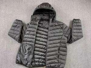 Chaqueta acolchada con cuello levantado para hombre y mujer en lona estilo informal de invierno con logotipo frontal servicio OEM al por mayor - Product Image 6