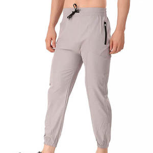 กางเกงวอร์มผู้ชายสไตล์ใหม่สำหรับใช้งานกลางแจ้ง คุณภาพดีที่สุด สีพื้น - Product Image 1