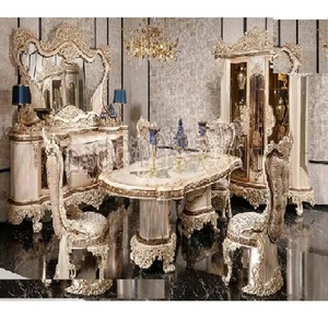 Juego de mesa de comedor tallada de lujo con tacto metálico plateado Juego de mesa y sillas de comedor de lujo con talla pesada de estilo europeo - Product Image 1