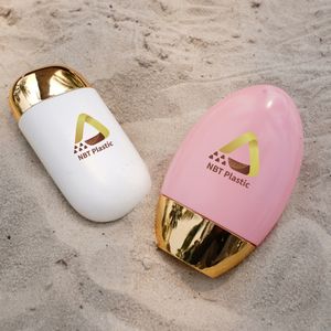 Botella de protección solar de plástico HDPE con logotipo personalizado NBT de alta calidad, diseño de belleza blanco o rosa para mujer - Product Image 3