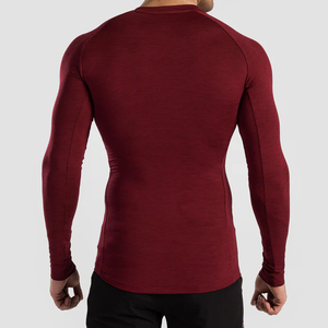 เสื้อคอมเพรสชั่น OEM ผลิตตามสั่ง คุณภาพสูง เสื้อรัดกล้ามเนื้อสำหรับผู้ชาย MMA ระบายอากาศ ป้องกันแบคทีเรีย แห้งเร็ว ไร้ตะเข็บ แขนยาว - Product Image 2