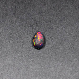 หินโอปอลหลากไฟสีดำธรรมชาติขนาด11x7มม. ลูกแพร์ Cabochon 1.80 CTS อัญมณีสำหรับทำเครื่องประดับ - Product Image 1