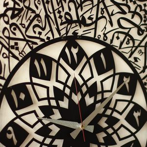 Trending Black Ayat ul Kursi Arabic Calligraphy Islamic Decorative Metal Wall Clock Modern Decorative Clock for Ramadan Decor - Product Image 2