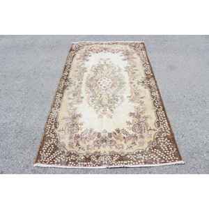 Tapis turc 3,9x6,5 pieds, tapis vintage, tapis en laine marron à motifs de plantes et d'arbres - Product Image 1