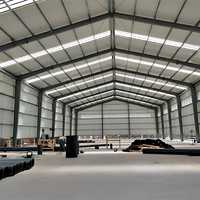 Bâtiment d'entrepôt en acier durable, structure d'atelier de stockage industriel personnalisée, toit bleu pour la logistique A...