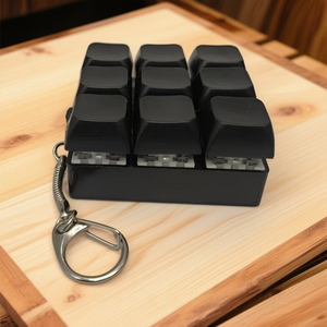 พวงกุญแจเครื่องทดสอบสวิตช์คีย์บอร์ดแบบกลไก 9 ปุ่ม |   ของเล่นบีบคลายเครียด - Product Image 4