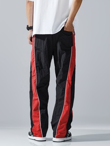Pantalon de survêtement élégant pour homme, coupe ample et large, avec empiècements contrastants noir et blanc, taille à cordon de serrage, confortable pour le quotidien - Product Image 6