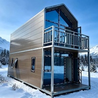 Petit chalet démontable à 2 étages de 50 m² en CLT avec finition bois et véranda