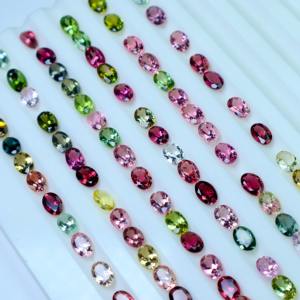 Vente en gros de pierres précieuses en tourmaline naturelle 6x4mm taille ovale, pierre semi-précieuse multicolore polie pour la fabrication de bijoux - Product Image 1