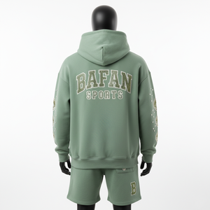 ชุดเซ็ตฮู้ดดี้และกางเกงขาสั้นผ้าฟลีซผสมคอตตอนโพลีเอสเตอร์ 340 GSM สีเขียวเซจสำหรับผู้ชาย พร้อมปักโลโก้ด้วยคริสตัลและงานพิมพ์ลายตามสั่ง - Product Image 2