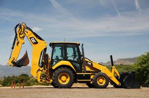 Chargeuse-pelleteuse Caterpillar 440 d'occasion, modèle 2023, jaune, avec moteur et godet avant hydraulique de qualité, fournie par l'entreprise - Product Image 2