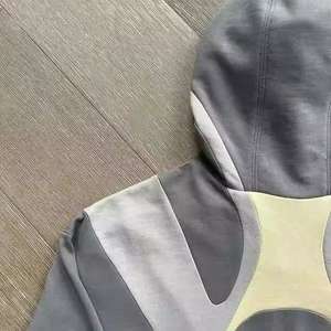 เสื้อสเวตเชิ้ตโอเวอร์ไซส์ทรงหลวมมีฮู้ดสไตล์สตรีทสั่งแบบธรรมดา - Product Image 3