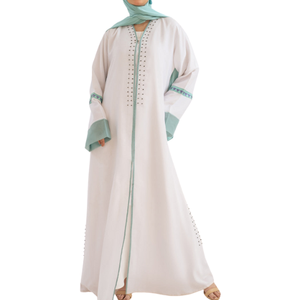 SWAN IN PARADISE ABAYA VIENT EN BLANC AVEC UNE BRODERIE BLEU CLAIR SUR LA MANCHE ET LES BORDS DE SON TISSU HIJAB DE HAUTE QUALITÉ CORRESPONDANT - Product Image 1