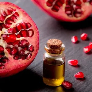 Huile de pépins de grenade biologique pressée à froid Approvisionnement en gros de qualité supérieure pour les formulations de soins de la peau et des cheveux - Product Image 1