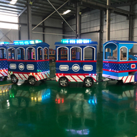 Un train touristique électrique sans rails populaire pouvant transporter des passagers, des magasins, des parcs et des enfants.