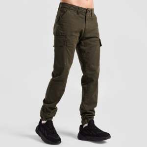 Pantalon de jogging sportif Trek en toile 100% coton, logo personnalisable, motif camouflage, taille XL, fermetures éclair tissées disponibles, couleur olive - Product Image 1