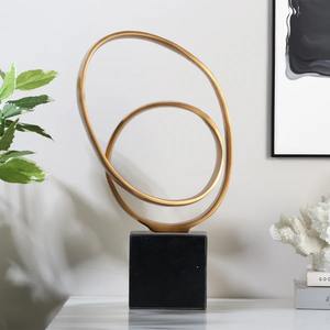 Abstract Gold Loop Sculpture On <b>Black</b> Base Modern Decorative Showpiece For Home Living Room <b>Shelf</b> Or Office Tabletop - Product Image 5