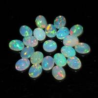 Vente en gros de cabochons ovales en opale éthiopienne blanche naturelle Welo Fire Opal Pierres précieuses en vrac pour la fabrication de bijoux pendentifs Approvisionnement en vrac