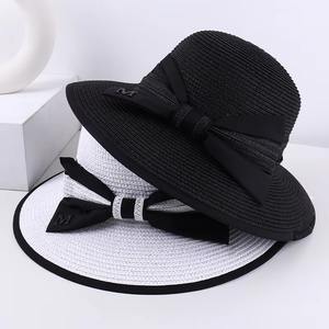 Sombrero de sombrilla de nailon de primavera y verano a la moda con decoración de lazo transpirable cómodo para viajes al aire libre vacaciones en la playa - Product Image 1