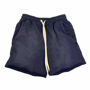 กางเกงขาสั้นสีตัดกันใส่สบายสำหรับใช้ในยิมสีไม่ซีดจางทำจากปากีสถาน - Product Image 1