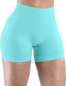 Pantalones cortos de yoga elásticos de poliéster 100% para gimnasio activo de cintura cruzada de alta moda para mujeres con bolsillos laterales - Product Image 6