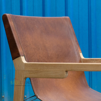 Fauteuil de relaxation minimaliste en teck massif et cuir, style Bali Mid-Century, idéal pour hôtels et resorts (intérieur/extérieur) - Meilleures ventes