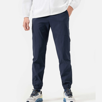 Pantalon de jogging sportif OEM en toile, taille mi-haute, extensible, confortable, protection UV, coupe-vent, plissé devant, fermeture à cordon de serrage pour homme