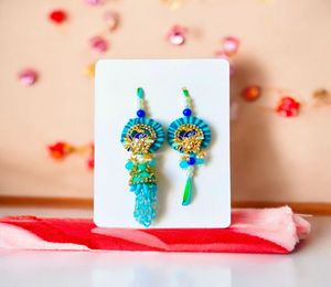 Rakhi espiritual con símbolo de Rudraksha y Om Ideal para tiendas religiosas y mercados de templos - Product Image 1