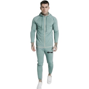 Por encargo Precio al por mayor Slim Fit Manga larga Cremallera Secado rápido Color sólido Sudor 100% Algodón Hombres Chándales - Product Image 1