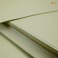 Housses de protection sophistiquées en cuir pour ordinateur portable avec finition élégante, résistance aux rayures, ajustement sûr et design de luxe